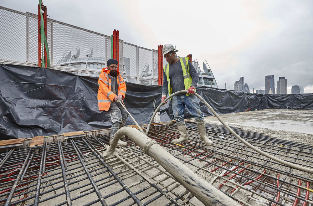 Derwent's White Collar Factory pumping screed | Construction Photography London