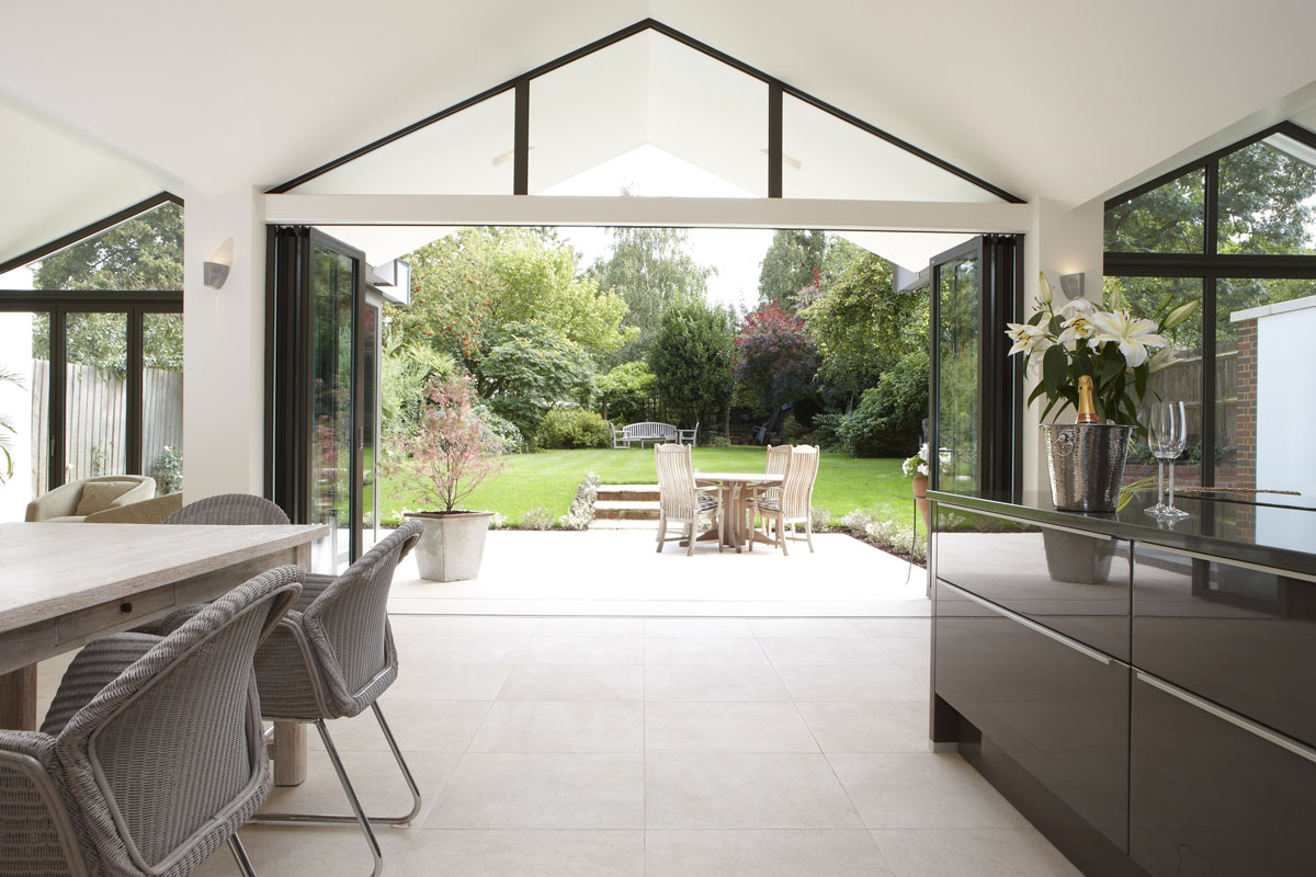 Hitchin Kitchen limestone tiling by mace architects | Interiors Photographer London