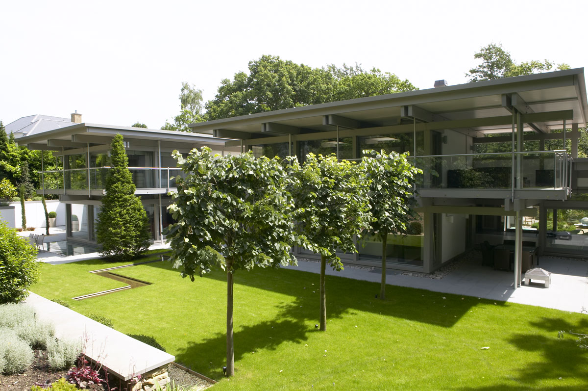 Twin wing Huf Haus with linking hallway and garden rill | Residential Photographers London