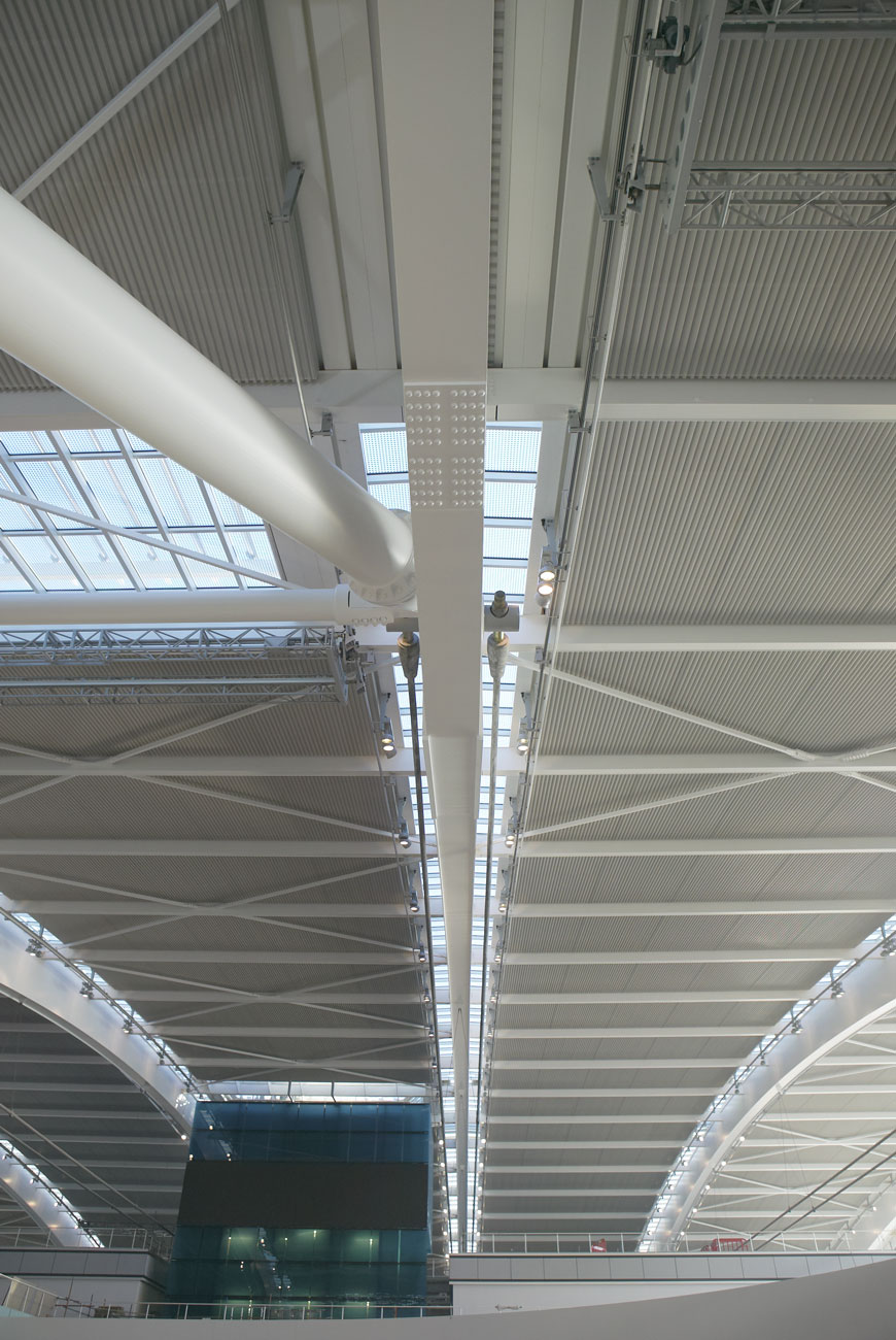 Heathrow Airport Terminal 5 steel and glass arched roof | Commercial Photographers London